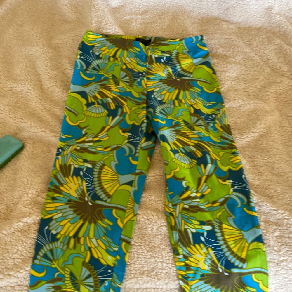 Stretch side zip, multi colour ankle length pants.